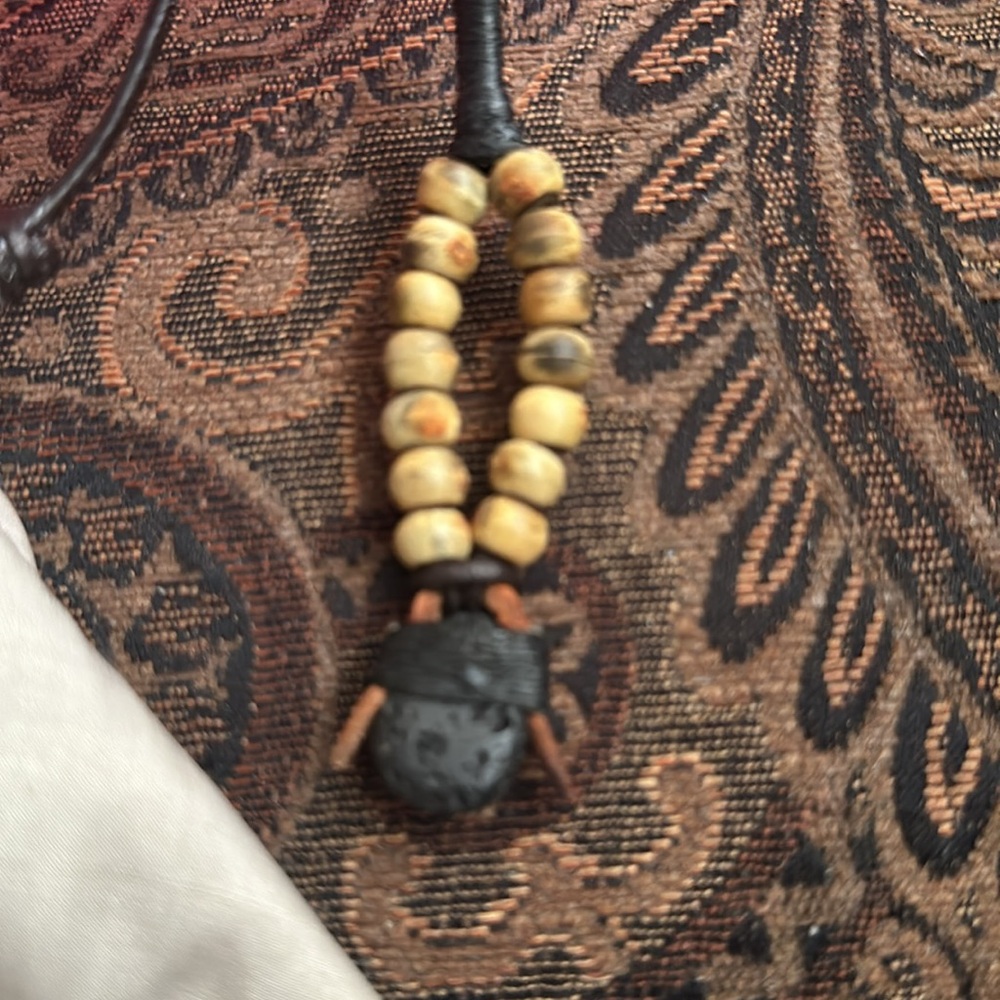 Antique African leather   Tanzanian Amulet with volcanic stone